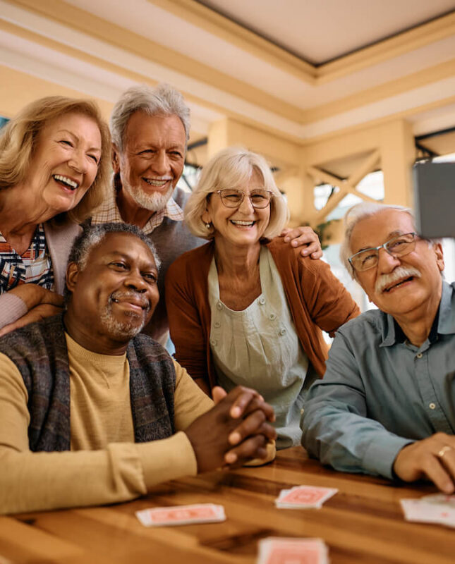 Seniors smiling at independent senior living community